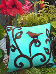 A Bird in Hand Wool Applique Throw Pillow